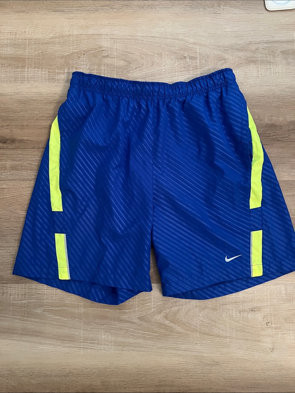 Nike Men’s Royal Blue Athletic Shorts with Neon Yellow Stripes
